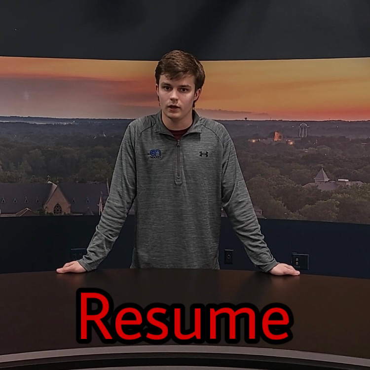 Charlie Morris covering breaking news at Notre Dame behind NDTV desk.